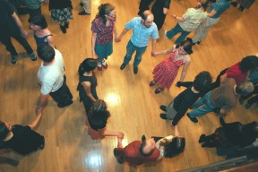 square and contra dancers at a retro dance